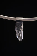 Water Clear Nepalese Inclusion Quartz pendant shown worn on a silver choker with dark oxidized 925 silver cap.