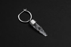 Raw Clear Quartz single hoop earring shown on a dark background with sterling silver hoop fitting.