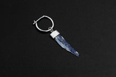 Natural Blue Kyanite single dangle earring shown on a dark background with polished sterling silver hoop fitting.