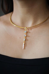 Zircon Australian Opal Blue Moonstone Herkimer Diamond and South Sea Pearl pendant shown worn on a necklace.