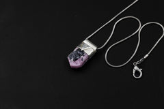 Ruby Black Mica Stack Pendant shown on a black necklace with organic 925 sterling silver cap and raw mineral texture.