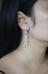 Blue Moonstone and Clear Quartz cascade earrings shown beside a ruler, with 6 cm sterling silver stud drop design.