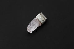 Light Pink Kunzite Stack Pendant shown on black background with textured sterling silver cap and raw crystal form.