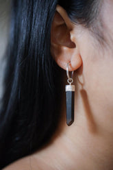 Australian Smoky Citrine Phantom single hoop earring in 925 sterling silver shown worn on the ear with smoky crystal drop.