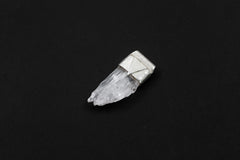 Unpolished Light Pink Kunzite Stack Pendant shown on black background with raw crystal texture and silver cap.