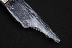 Close-up of natural Pink Kunzite crystal with delicate striations and handmade sterling silver cap.