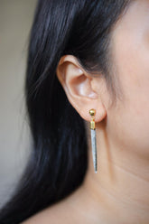 Handmade 18k gold-plated 925 sterling silver Himalayan Chlorite Quartz icicle earrings shown worn on the ear, with long raw crystal spikes.