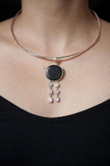 Shungite Blue Moonstone pendant shown worn on the chest, with high-shine 925 sterling silver and twin lunar dangle strands.