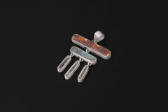 Flame and Tide Harmony pendant shown on a dark background with Red Kyanite, Aquamarine, Clear Quartz dangles, and sterling silver setting.