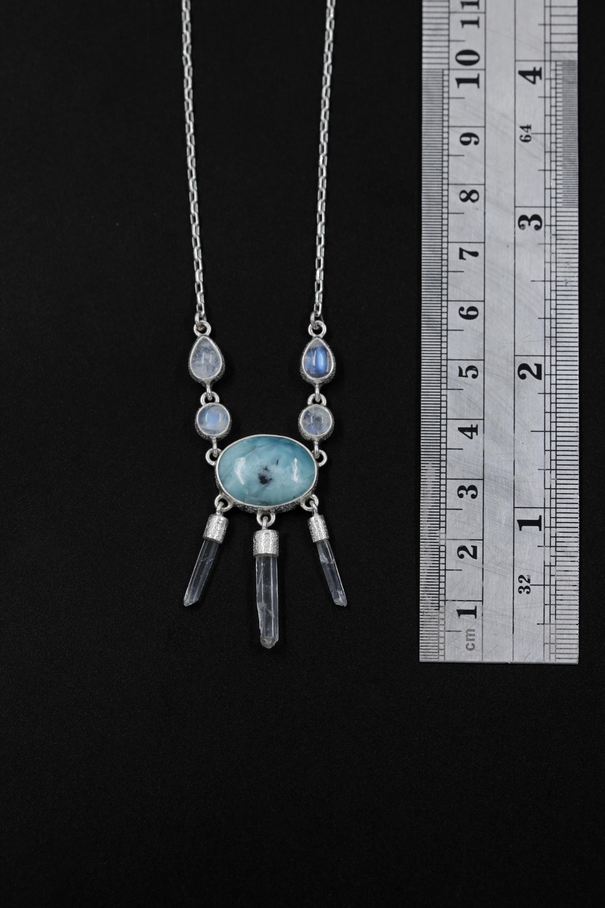 Larimar Blue Moonstone Clear Quartz necklace shown beside a ruler for scale, with a 5.5 cm pendant drop and sterling silver chain.