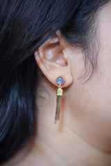 Blue Moonstone Smoky Quartz earrings shown worn on the ear with gold-plated settings and long smoky crystal drops.