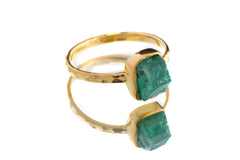 Raw Australian Emerald ring shown on a light background, with green beryl crystal and 18k gold-plated silver band.