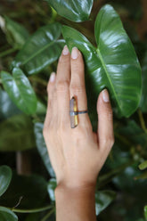 Handmade oxidized 925 sterling silver Smoky Citrine ring shown worn on the hand, with raw Torrington crystal point and hammered band.