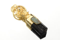 Aquamarine Black Tourmaline Divine Balance pendant shown on a white background with gold-plated mixed-metal talisman design.