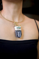 Dragon Talisman Pendant shown worn on the chest with Black Tourmaline, Turquoise, Moonstone, and sterling silver detail.