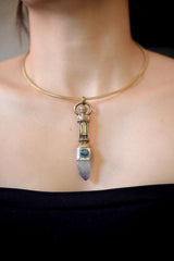 Pendant worn on model displaying proportion, vertical alignment, and light interplay between amethyst and kyanite.