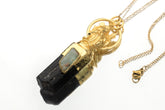 Divine Balance Aquamarine Black Tourmaline pendant shown on a white background with 18k gold-plated silver and brass setting.