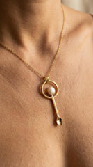 South Sea Pearl gold-plated fairy spoon pendant shown worn on a model as a ritual-inspired necklace.