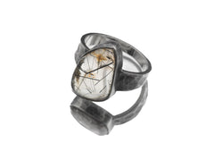 Side view of Black Rutile Quartz ring showing hammered sterling silver band and raised stone setting.