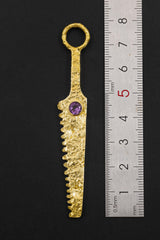Gold-plated Amethyst cutter spoon pendant shown beside ruler for long pendant size reference.