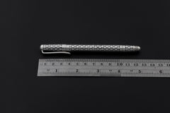 Sterling silver handmade pen shown beside a ruler for approximately 13 cm length reference.