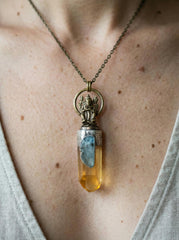 Ganesha Lemurian Quartz and Aquamarine talisman pendant shown worn as a sacred statement necklace.