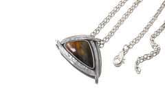 Tiger Eye triangle pendant shown with sterling silver chain and oxidized sun-ray silver setting.