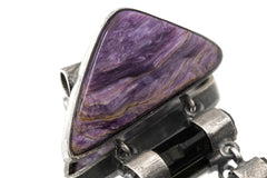 Charoite and Black Tourmaline heirloom pendant shown on a white background with hinged sterling silver construction.