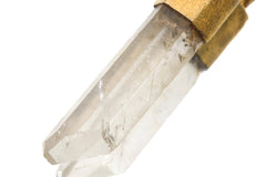 Close-up of Australian Lemurian Clear Quartz point in a gold-plated Monkey Tiger talisman pendant.