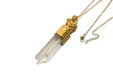 Monkey Tiger Lemurian Quartz talisman pendant shown on a white background with 18k gold-plated silver and clear crystal point.