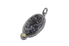 Dalmatian Jasper Ethiopian Opal pendant shown on white background with spotted gemstone and opal accent.