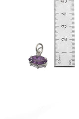 Amethyst marquise pendant shown beside ruler for petite gemstone pendant size reference.