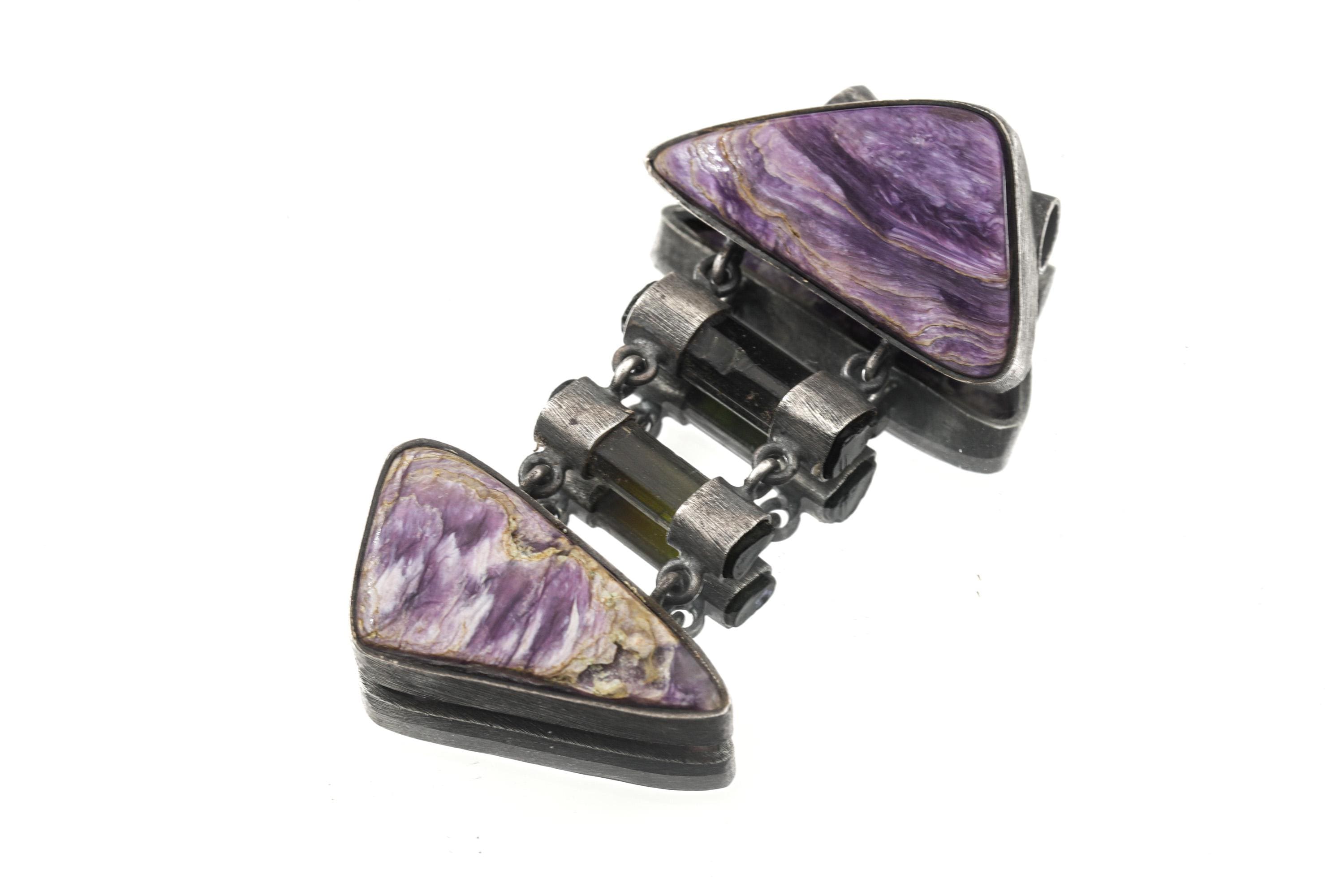 Charoite Black Tourmaline heirloom pendant shown on a white background with mirrored purple stones and sterling silver setting.