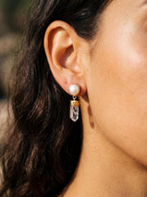 South Sea Pearl and Clear Himalayan Quartz gold-plated stud drop earrings shown worn on the ear, with crystal point dangles.