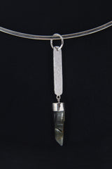Himalayan Quartz silver pendant displayed on a choker with slim vertical crystal talisman design.