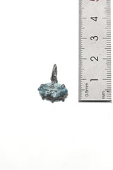 Blue Topaz marquise pendant shown beside a ruler for compact pendant size reference.