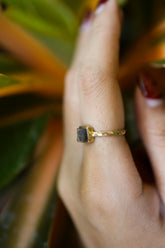 Gold-plated 925 sterling silver Pyrite ring shown worn on the hand, with a metallic golden stone and sturdy handmade band.