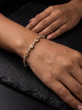 Citrine sterling silver bracelet shown worn on the wrist with golden marquise gemstones and polished silver links.