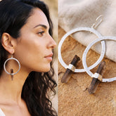 Twilight Portal Smoky Quartz hoop earrings in shiny hammered 925 sterling silver shown worn on a model.