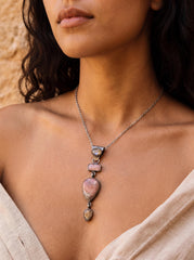 Moonstone Labradorite Rhodochrosite pendant shown worn on the chest, with layered stones and oxidized sterling silver texture.