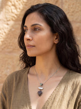 South Sea Pearl and Black Rutile Quartz pendant worn on model with oxidized sterling silver setting.
