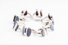 Group of Australian Opal Doublet Adjustable Rings shown from the side with high-polish hammered sterling silver.