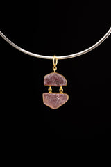 Double raw Indian Ruby pendant with mica inclusions and 16k gold-plated sterling silver setting, shown on a black cord.
