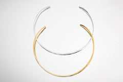 Silver and gold open collar chokers displayed together, showing handmade pendant base necklace options.