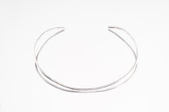 Sterling silver open collar necklace displayed on white background, showing clean minimal choker form.