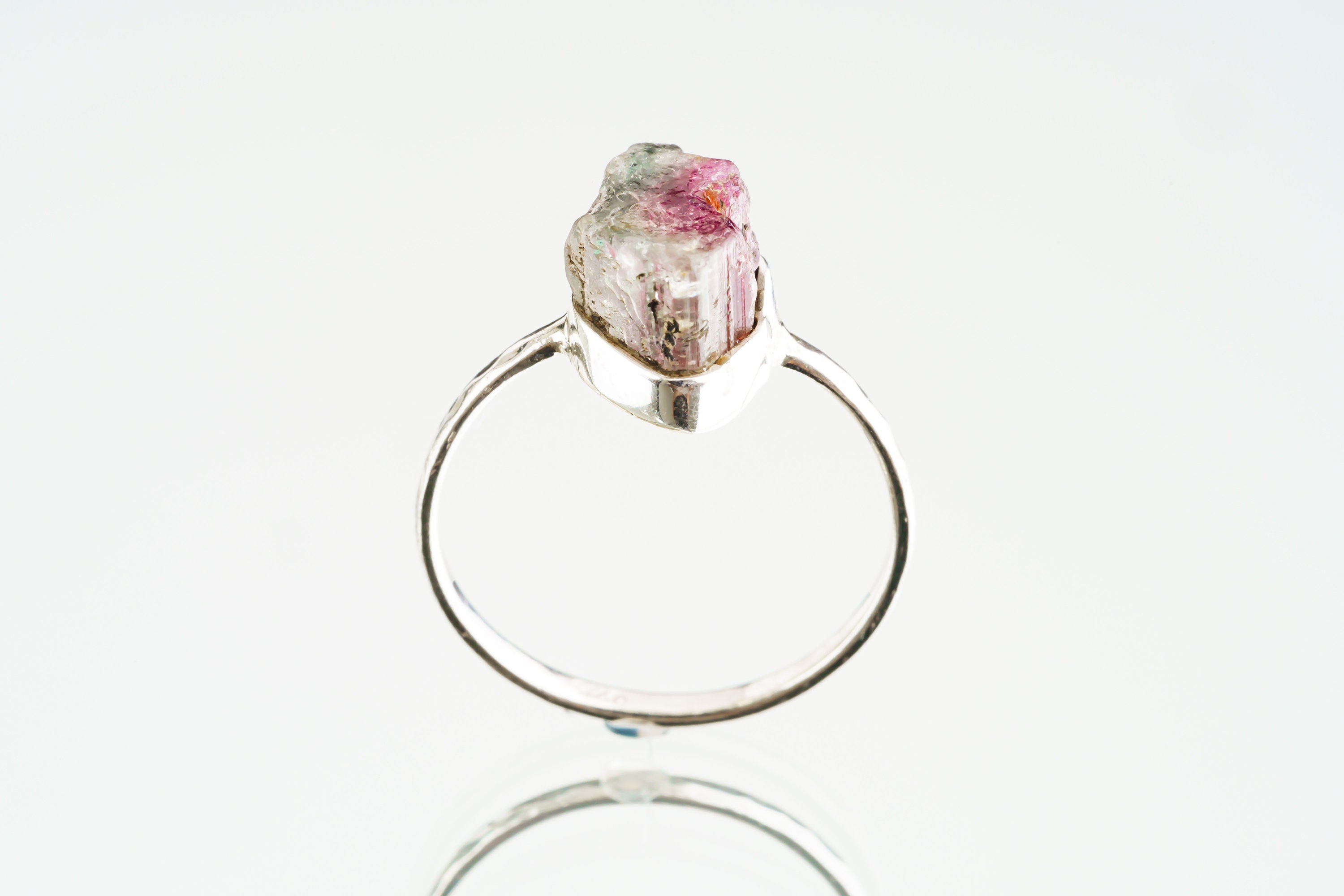 Front view of natural Watermelon Tourmaline ring with pink and green mineral zoning in a handmade sterling silver setting.
