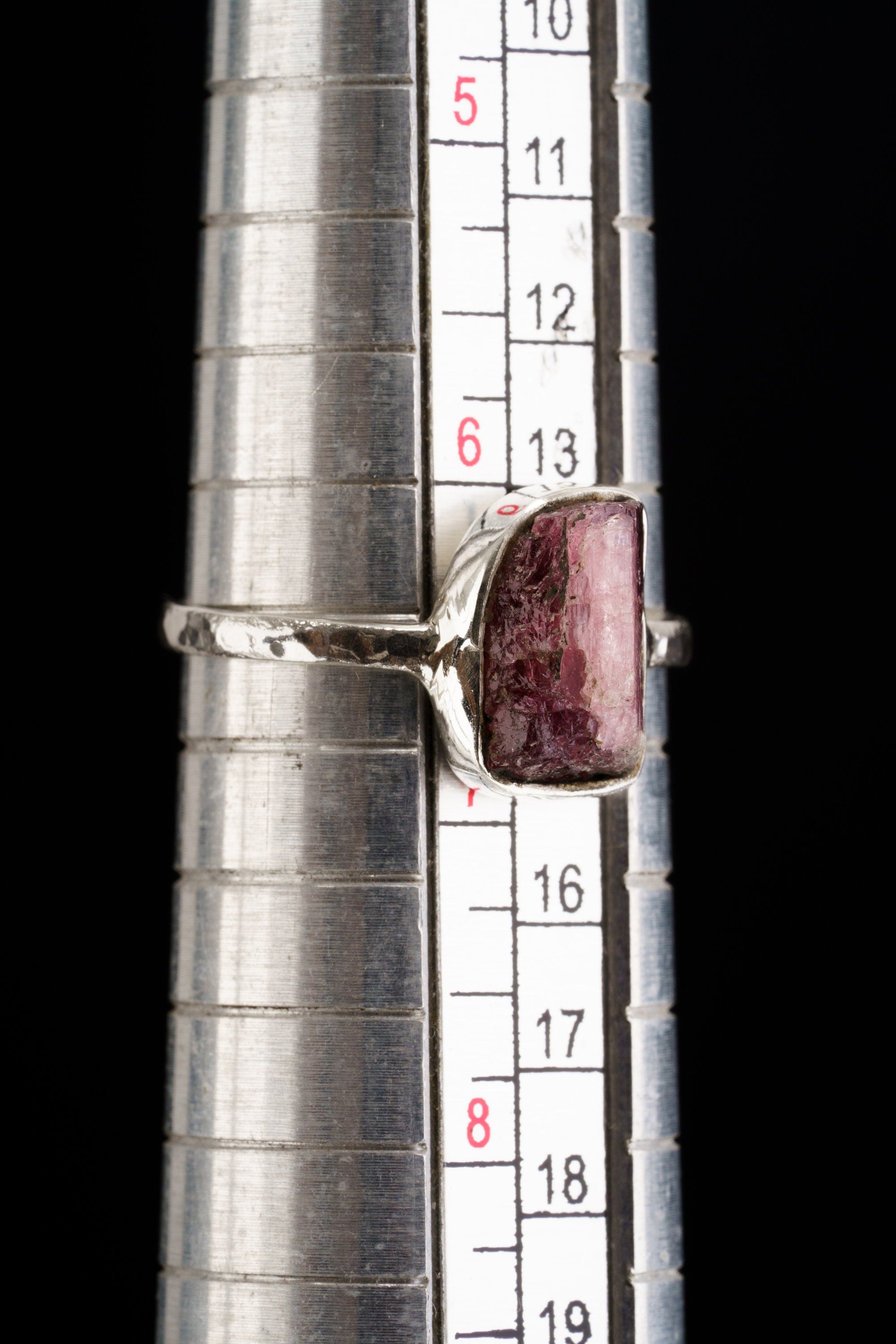 Pink Tourmaline sterling silver ring shown on a ring mandrel for size reference, appearing around US size 6.5 to 7.