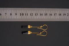 Black Tourmaline earrings shown beside a ruler for scale, with gold-plated sterling silver hooks and slim crystal drops.