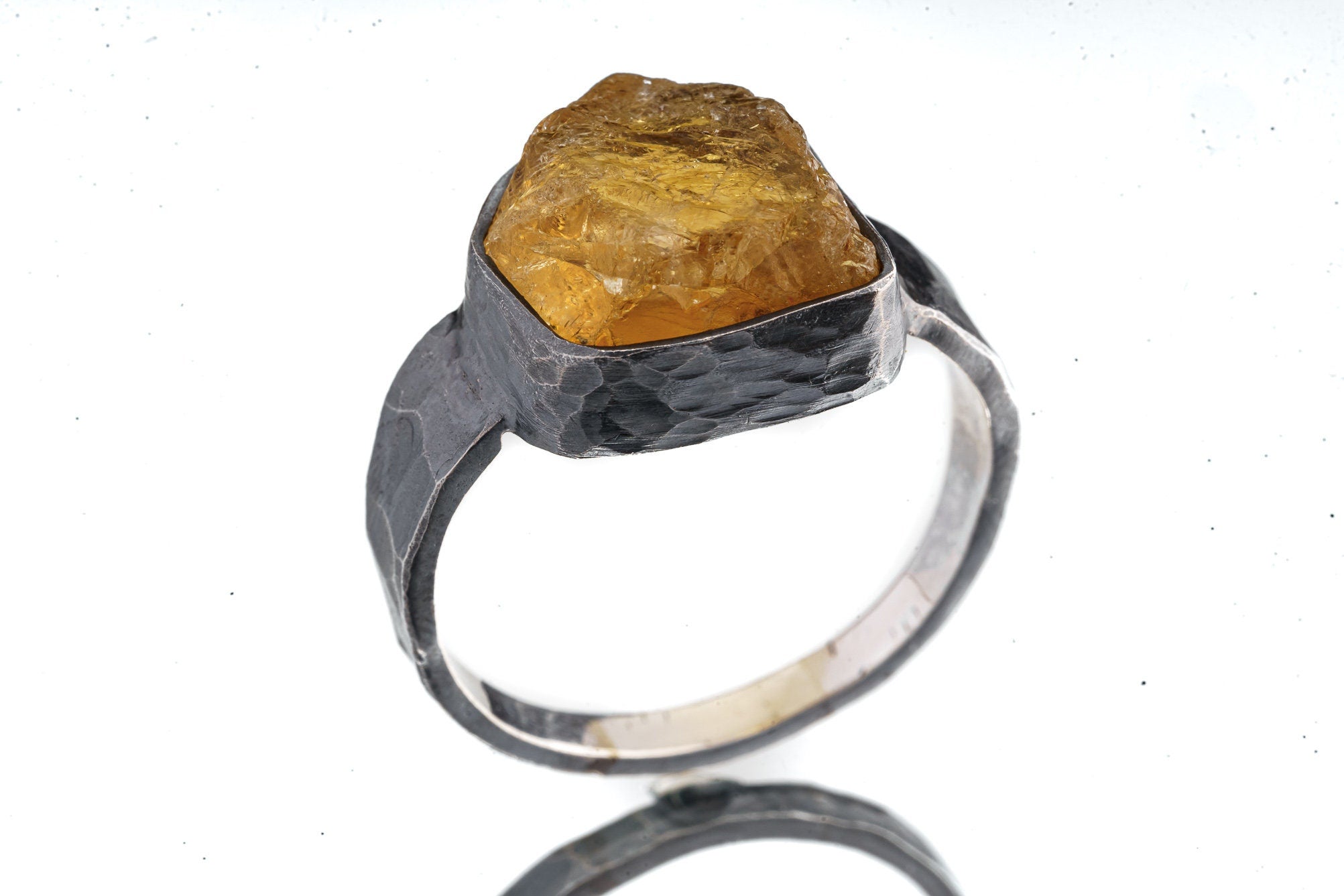 Front view of Citrine oxidized silver ring showing golden yellow quartz and strong hammered sterling silver profile.