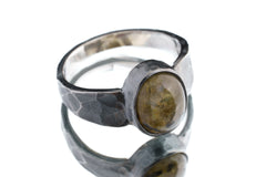 Side view of Labradorite ring showing oxidized sterling silver texture, raised bezel setting, and strong ring profile.